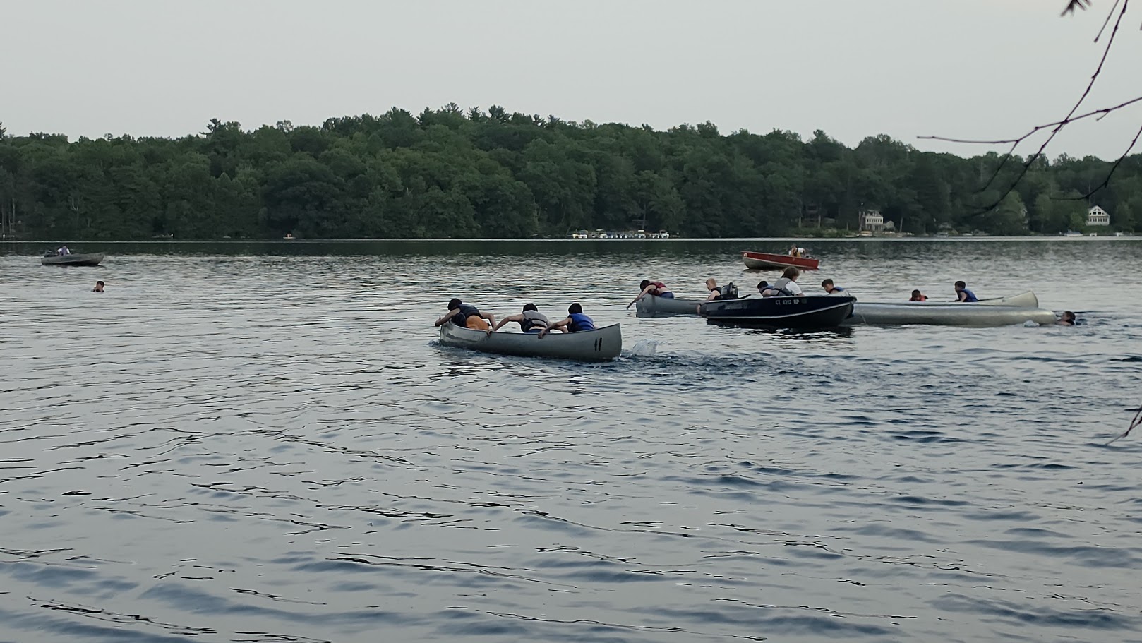 Canoes racing on the lake at Sequassen.